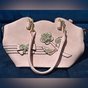 Elegant Pink Handbag with Gold Accents